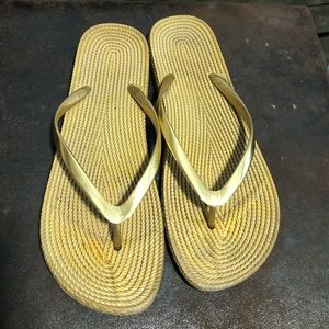 Gold flip flops
